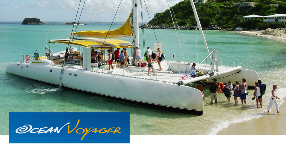 Ocean Voyager catamaran at the beach